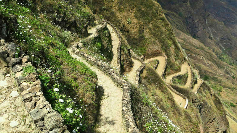 Zigzag road down at Cova de Paul